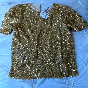 Blusa de lentejuelas nueva